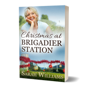Book cover of 'Christmas at Brigadier Station' by Sarah Williams with a woman and festive elements.