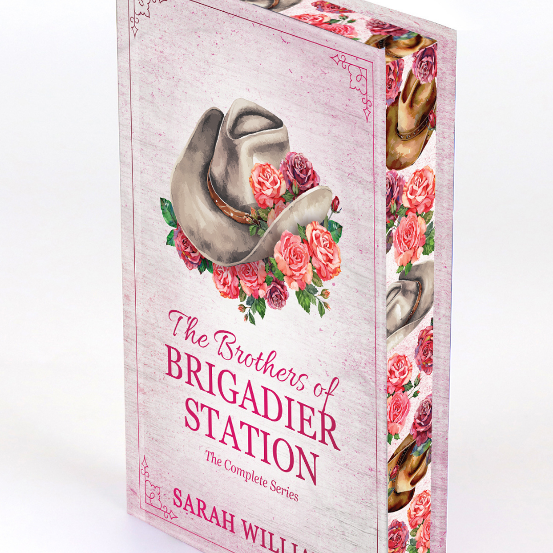 Book box with cowboy hats and flowers on a white background