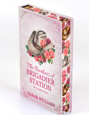 Book box with cowboy hats and flowers on a white background