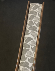 Special Edition sprayed edge featuring cowboy hats on a dark background