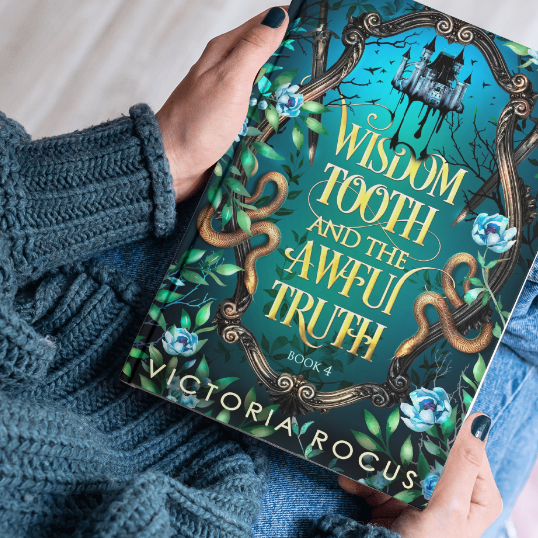 Book titled 'Wisdom Tooth and the Awful Truth' by Victoria Rocus held by a person wearing a blue sweater.