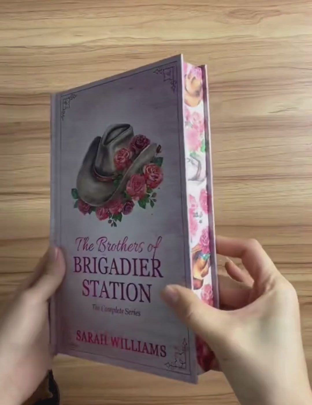 Video of hands displaying the special edition Brother of Brigadier Book with sprayed edges.