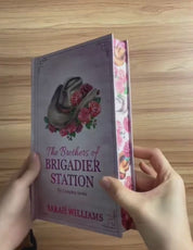 Video of hands displaying the special edition Brother of Brigadier Book with sprayed edges.